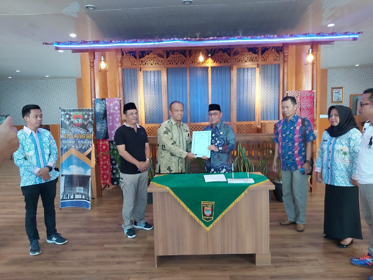 Badan Kepegawaian Negara (BKN) Regional VII Palembang menyerahkan surat persetujuan kenaikan pangkat